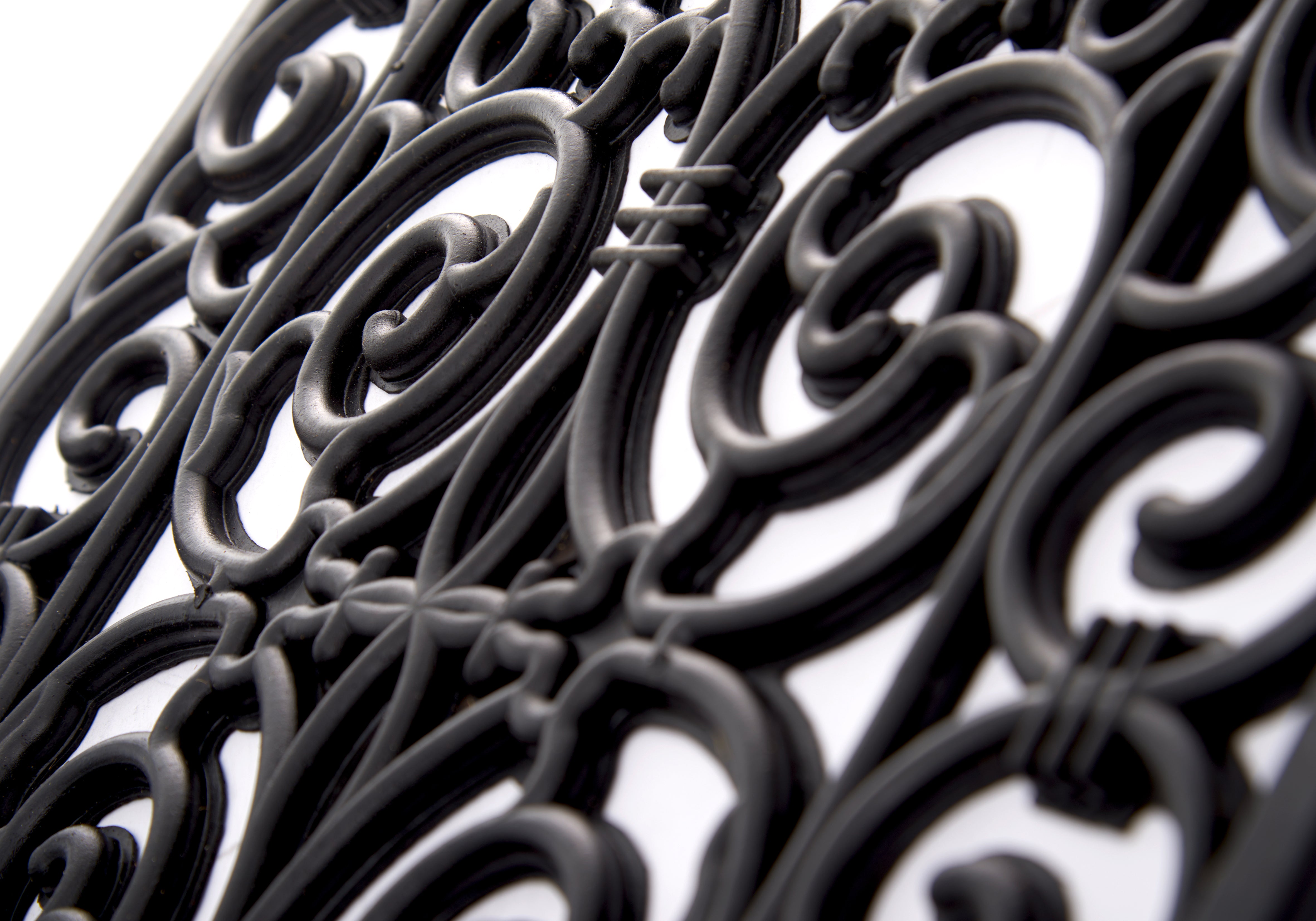 DÖRRMATTA I GUMMIBAND - SVARTA ORNAMENT